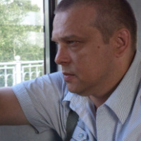 Юрий Романов